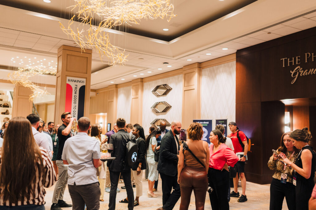 Personal injury attorneys and lawyers networking with vendors and exhibitors at the Personal Injury Mastermind Conference (PIMCon).