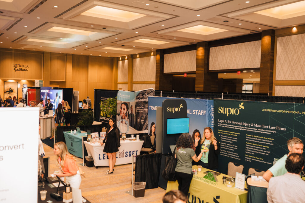 The exhibition hall at the Personal Injury Mastermind Conference filled with vendors and sponsors.