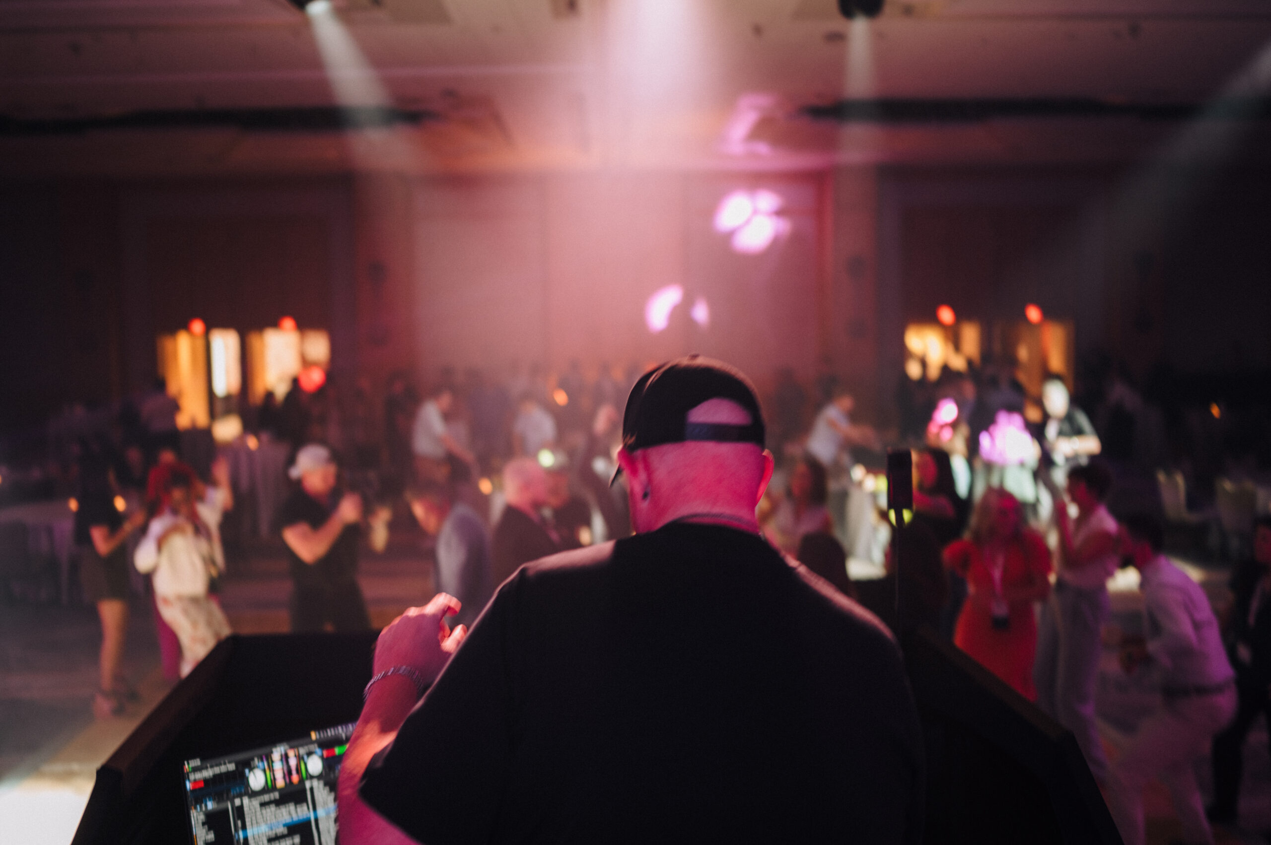 Lawyers and attendees celebrating at the closing party at the Personal Injury Mastermind Conference